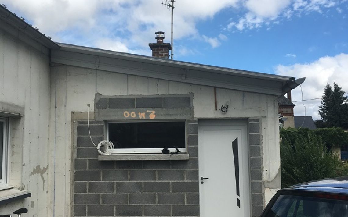 Isolation des murs extérieurs d'une maison à Beugnâtre