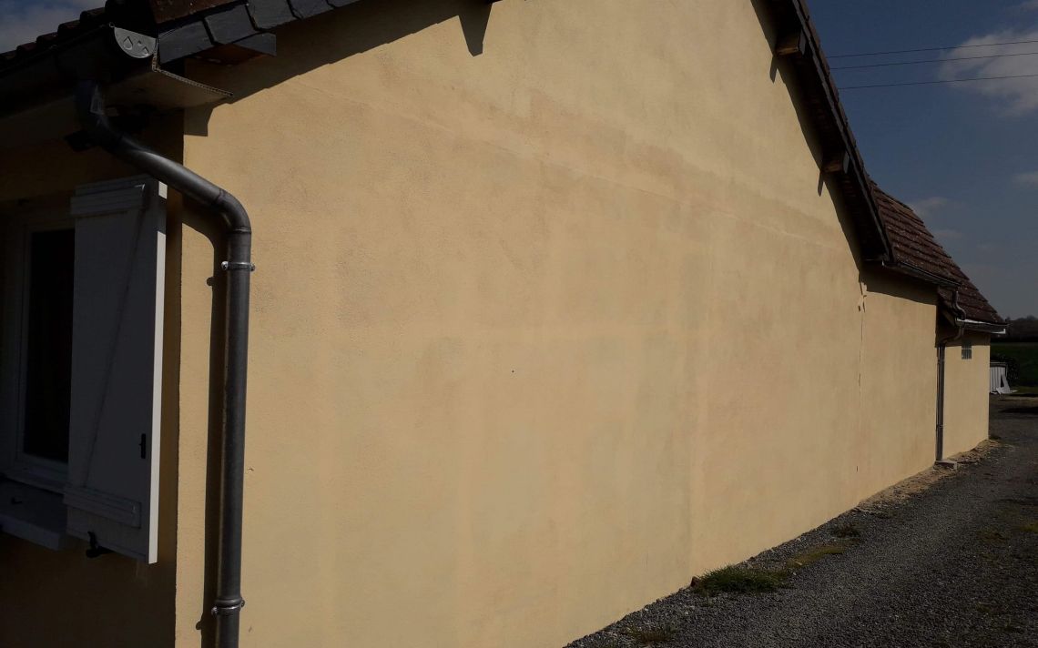 Isolation thermique et embellissement d'un pignon d'une maison des années 80