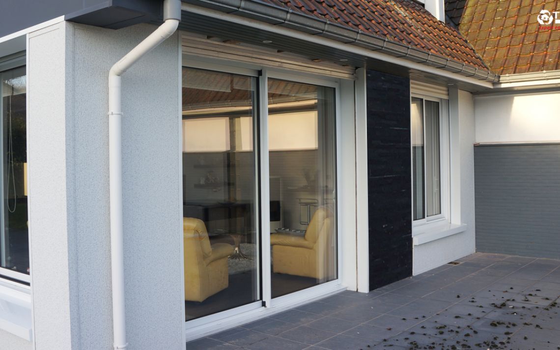 Isolation thermique et embellissement d'une grande maison avec jardin