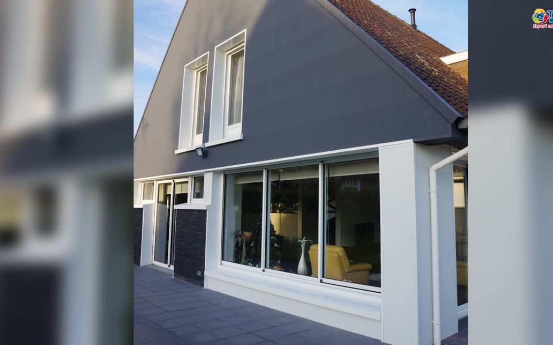 Isolation thermique et embellissement d'une grande maison avec jardin