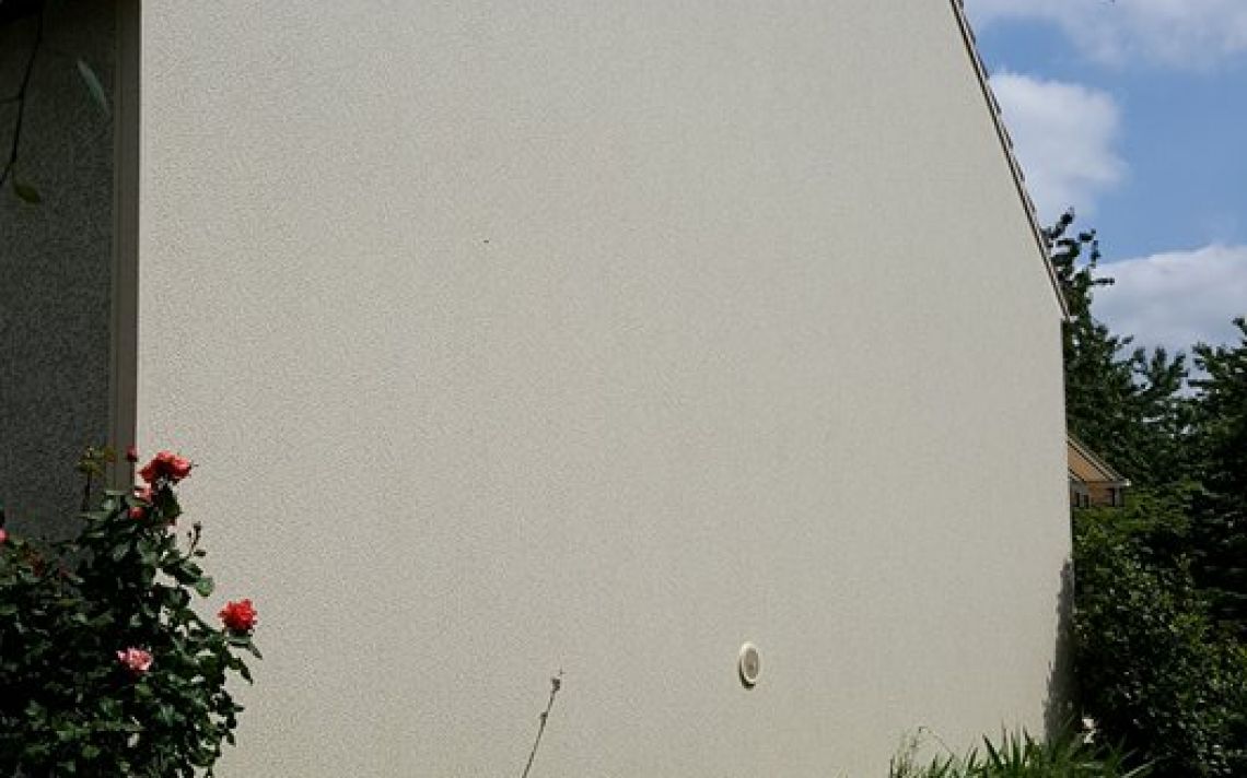 Ravalement et isolation du pignon d'une maison dans l'Essone