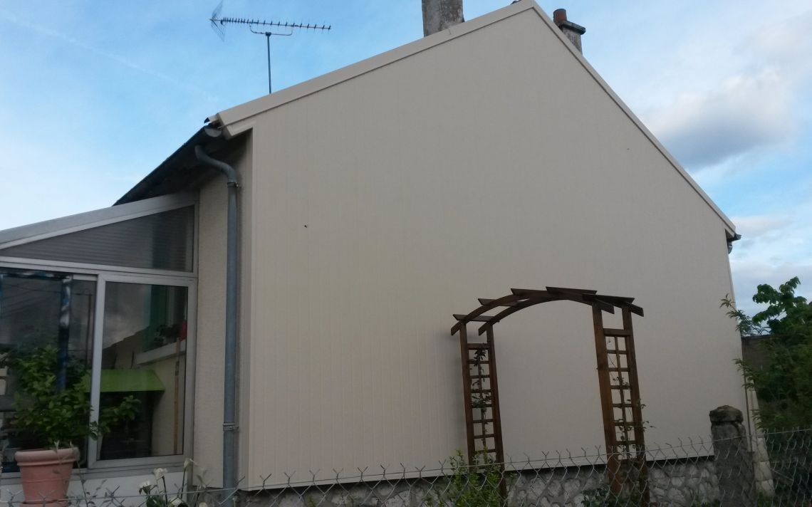 Rénovation d'un pignon exposé sud-ouest