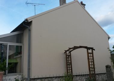 Rénovation d'un pignon exposé sud-ouest