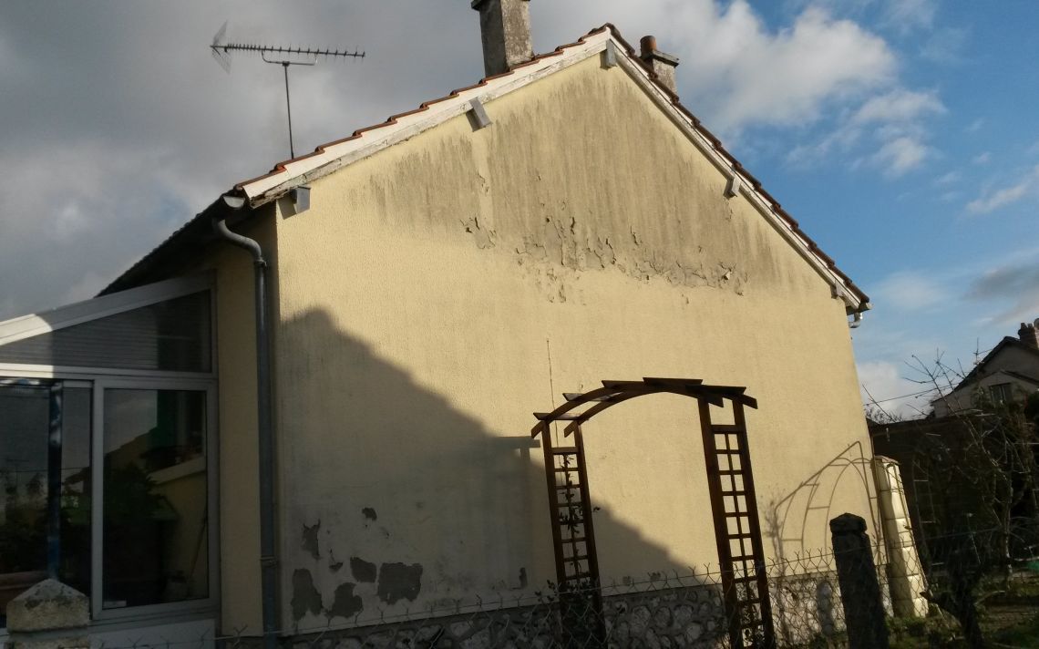 Rénovation d'un pignon exposé sud-ouest