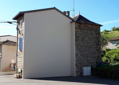 Rénovation thermique du pignon d'une maison de village en pierres