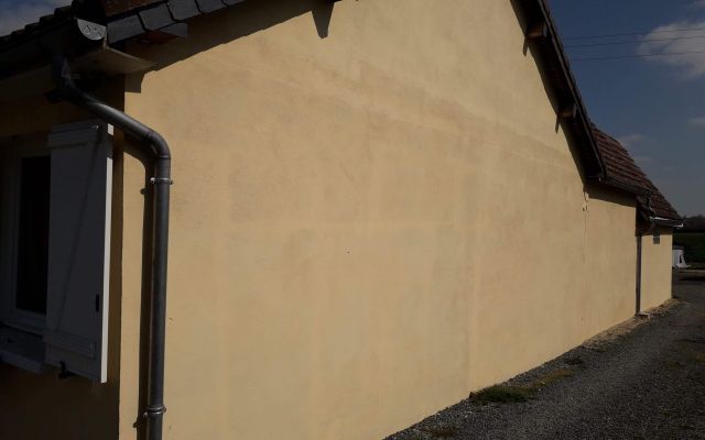 Isolation thermique et embellissement d'un pignon d'une maison des années 80